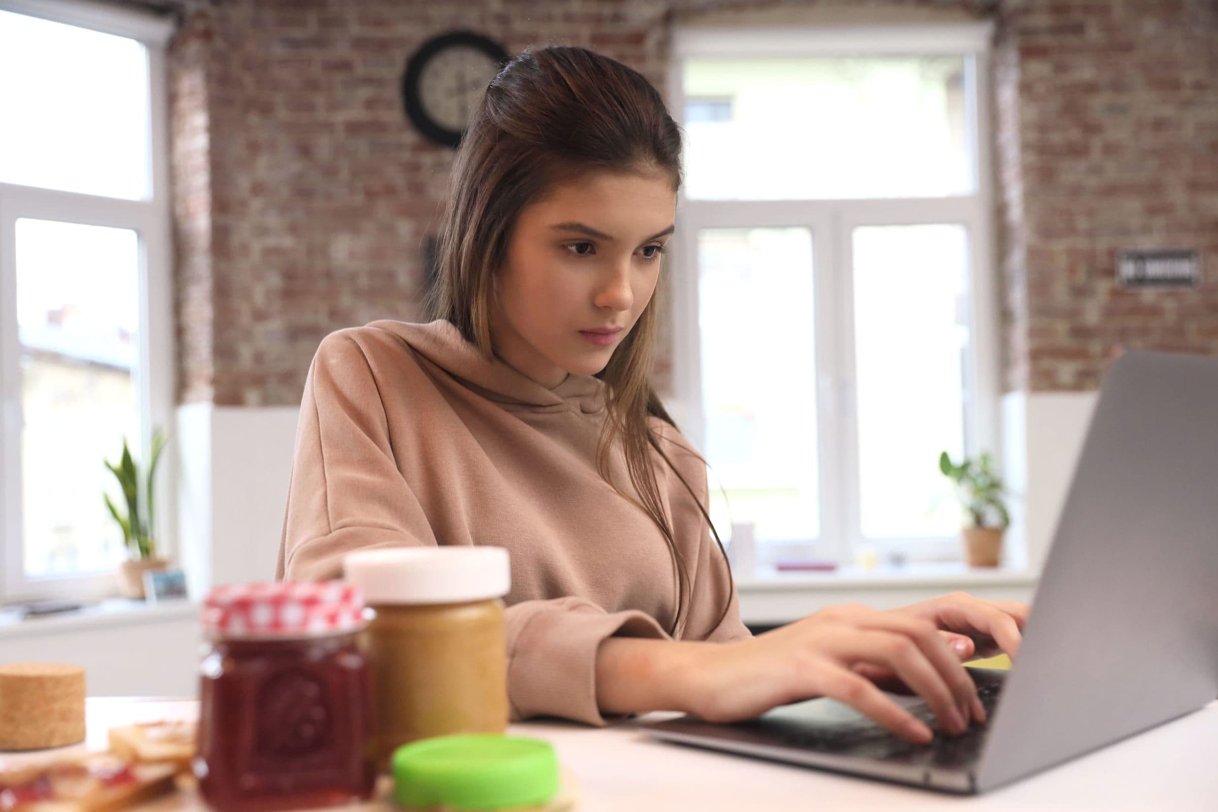 A young person studying at home