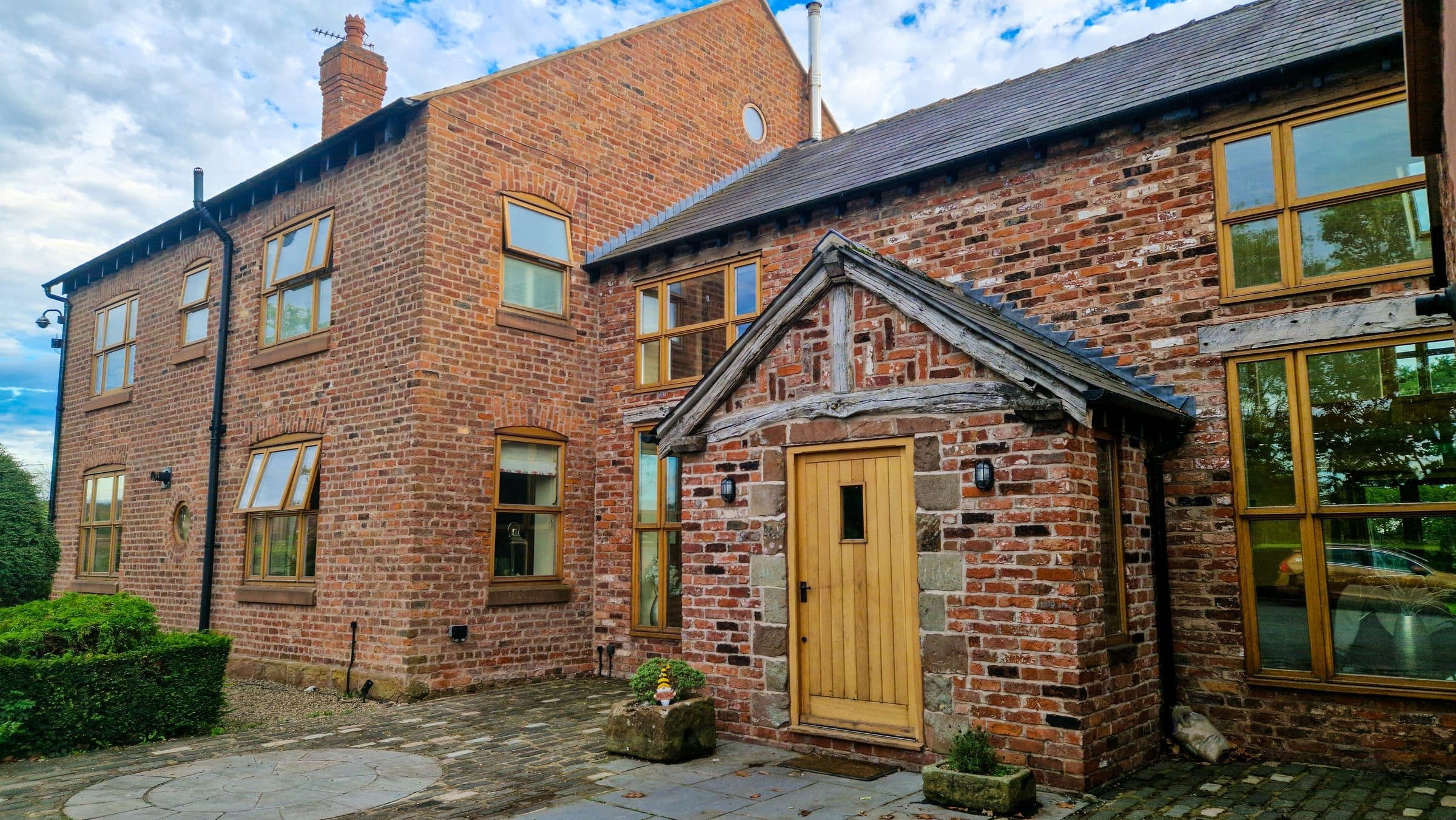 The Farm House, a restored red-brick country home