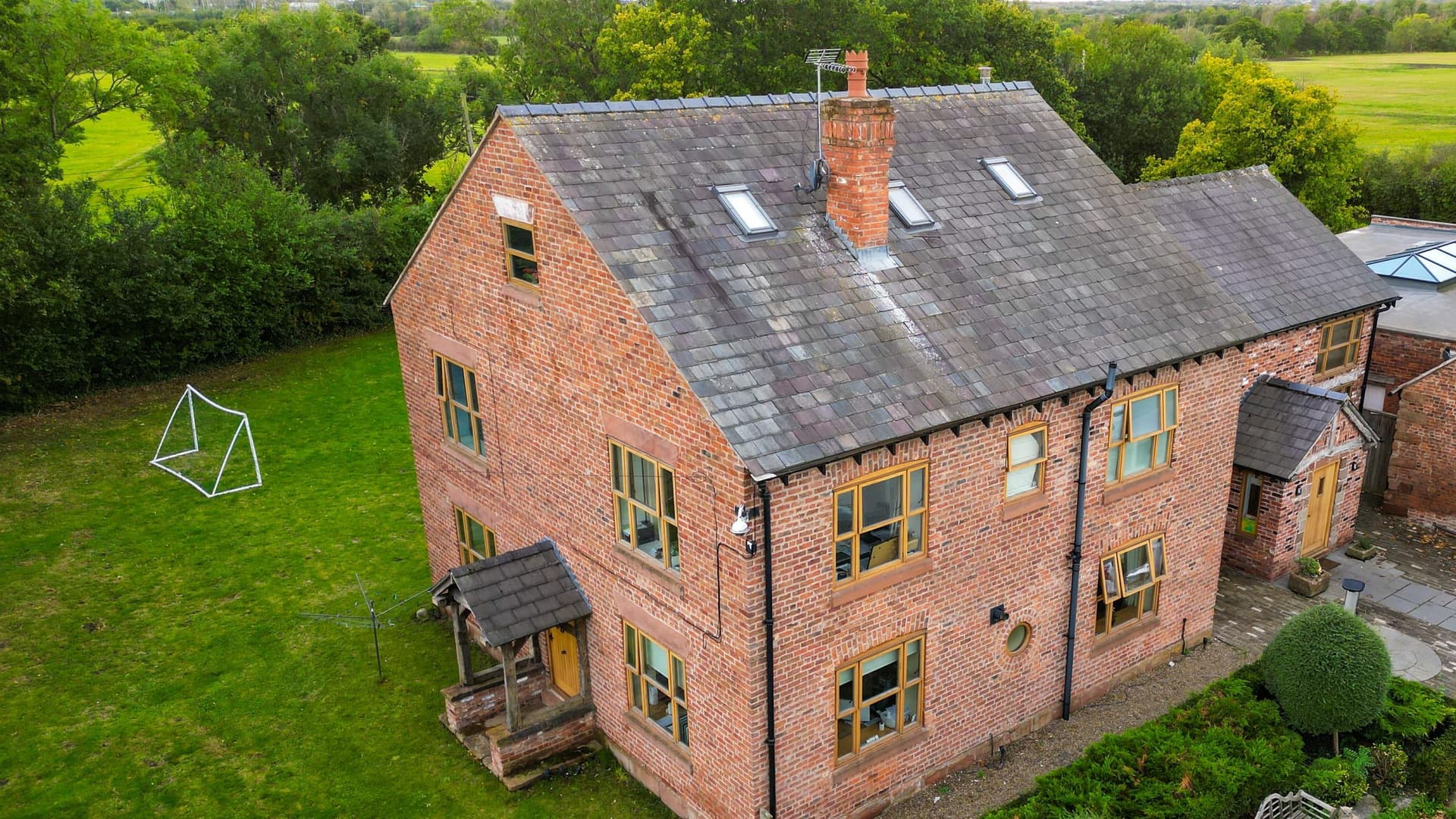 The Farm House and surrounding countryside from above